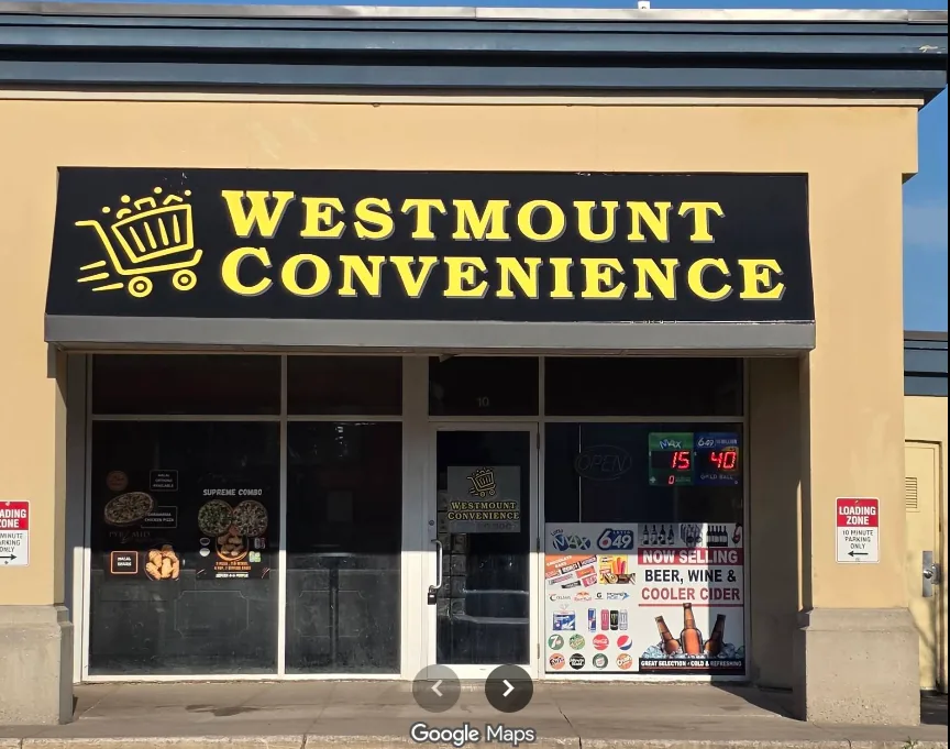 Westmount Convenience storefront with golden yellow lettering and a shopping cart on a charcoal sign
